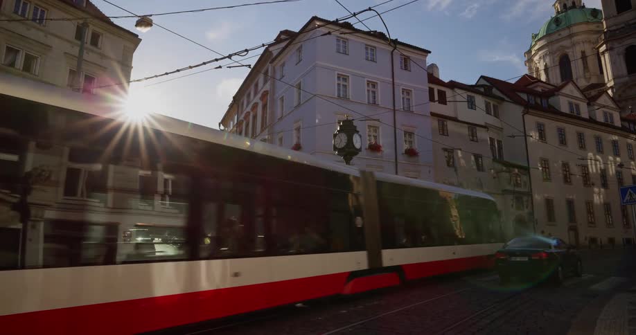 A city with buildings and a trolley