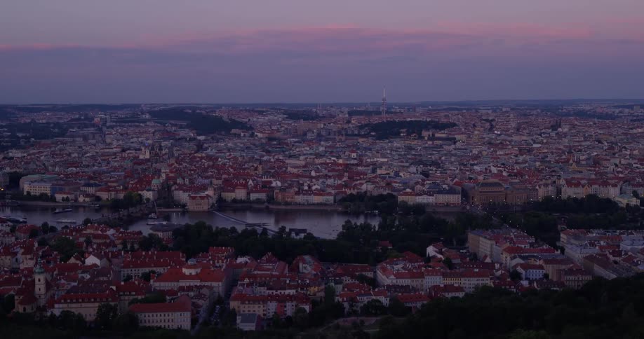 An aerial shot of a city at dusk