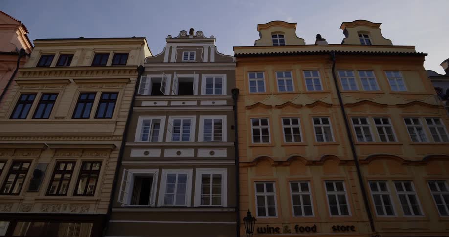 The apartment buildings are tall with many windows