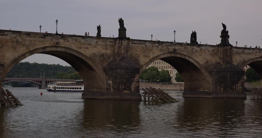Charles bridge crosses vltava river in prague