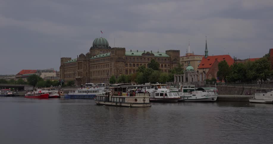 A ship sails past the port in the city