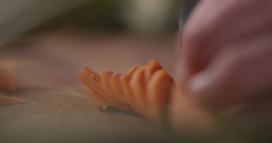 Cook slicing carrots thinly