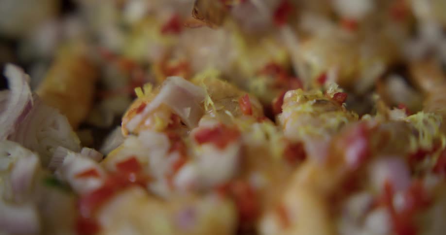 A close up of chopped food cooking in a pan