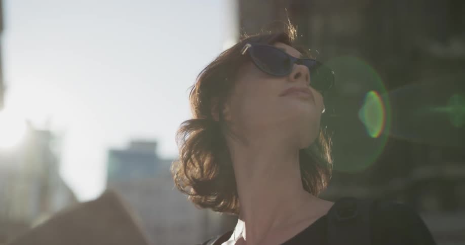 A woman looks at a map