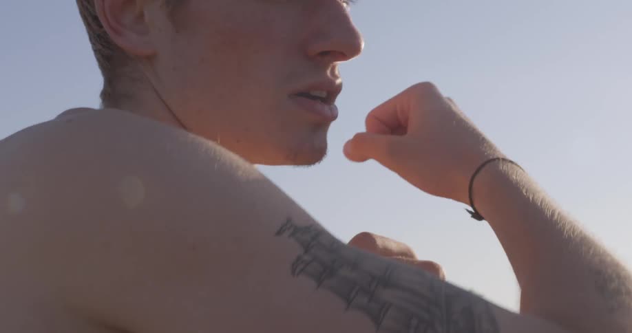 Man practice punches and strikes outdoors
