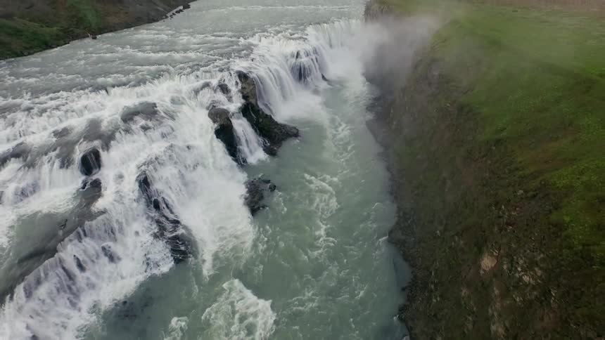 Many waterfalls pour into a river