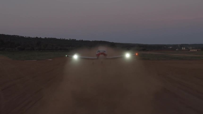 Airplane taking off from a dirt runway
