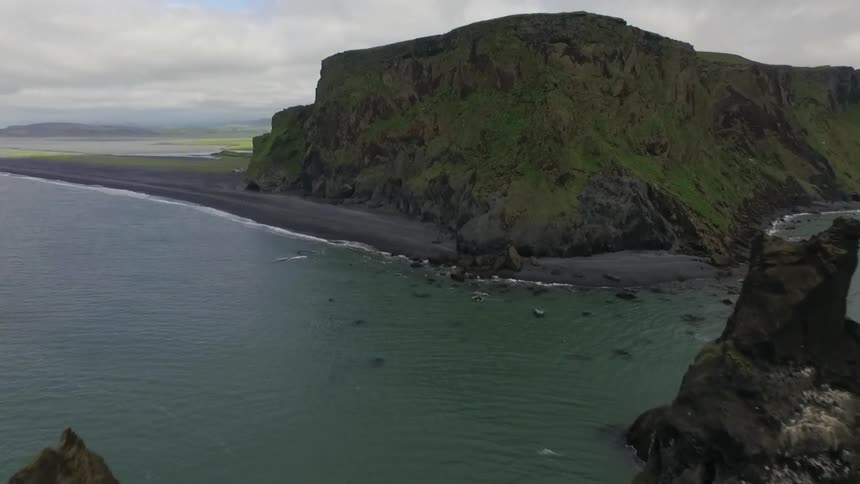 A piece of land juts out into the ocean