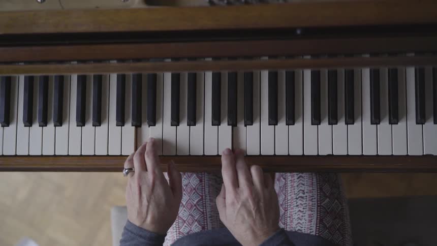 A woman playing piano