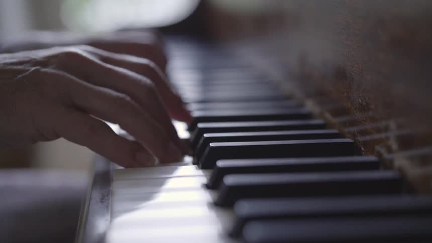 A person playing a piano