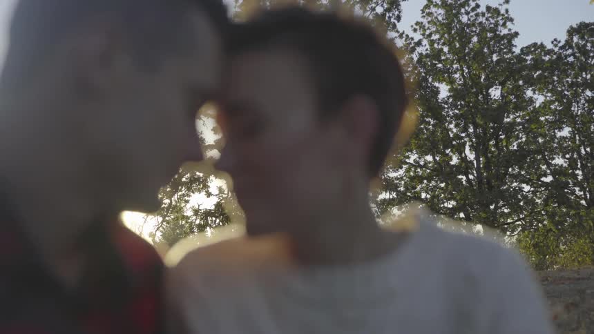 Man and women have a sentimental moment in the woods