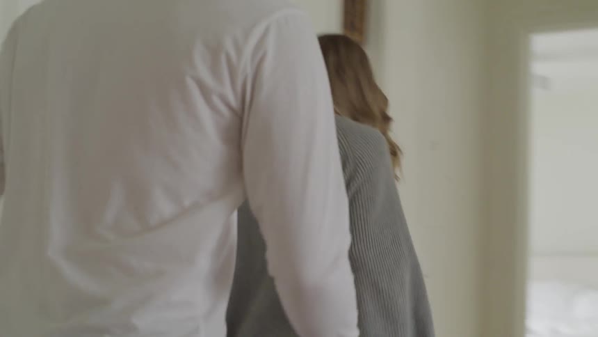 A man grabs a woman and they argue
