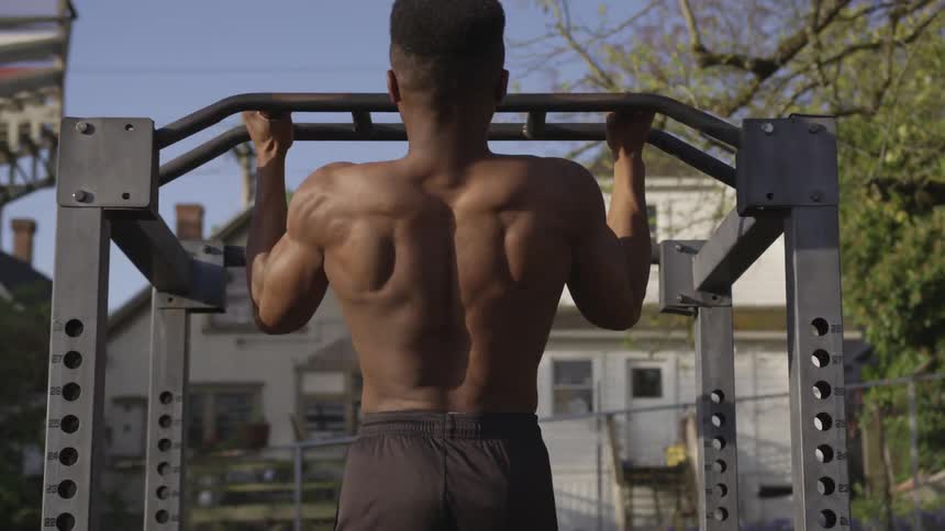Half naked black man pulls up in the neighborhood on a sunny day