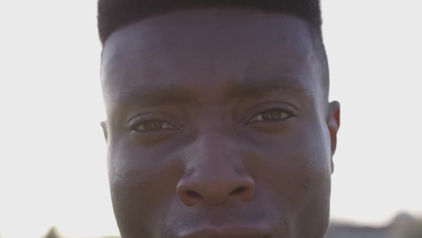 Man turns around to look at the camera