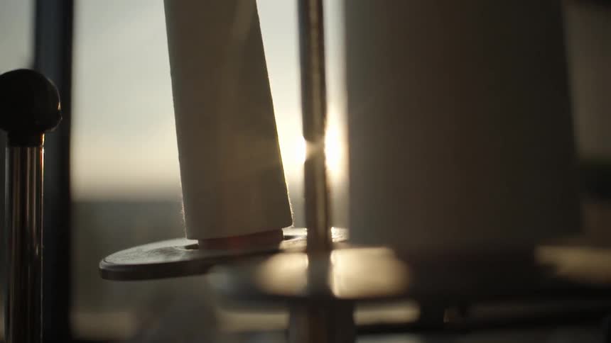 Close up of roll of linen on sunset