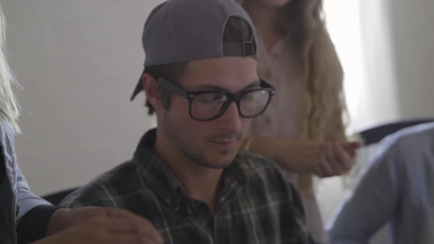 A group of people talking with each other