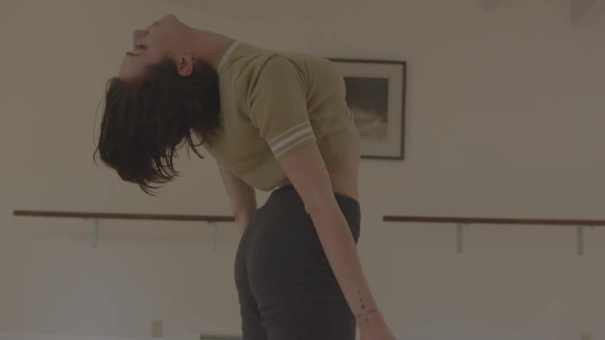 Woman standing up straight from back bend