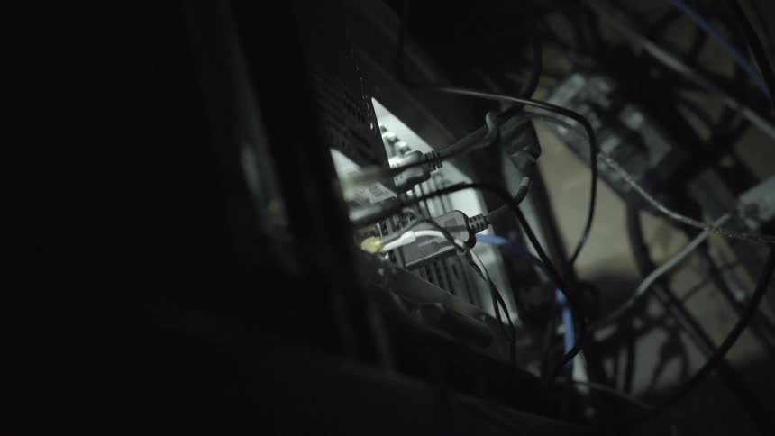 Cables connected to back of computer tower