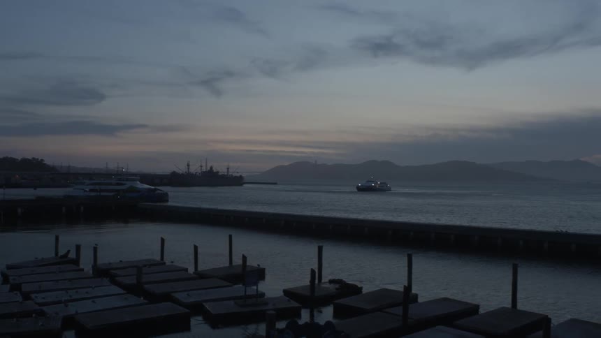 A boat sails into port