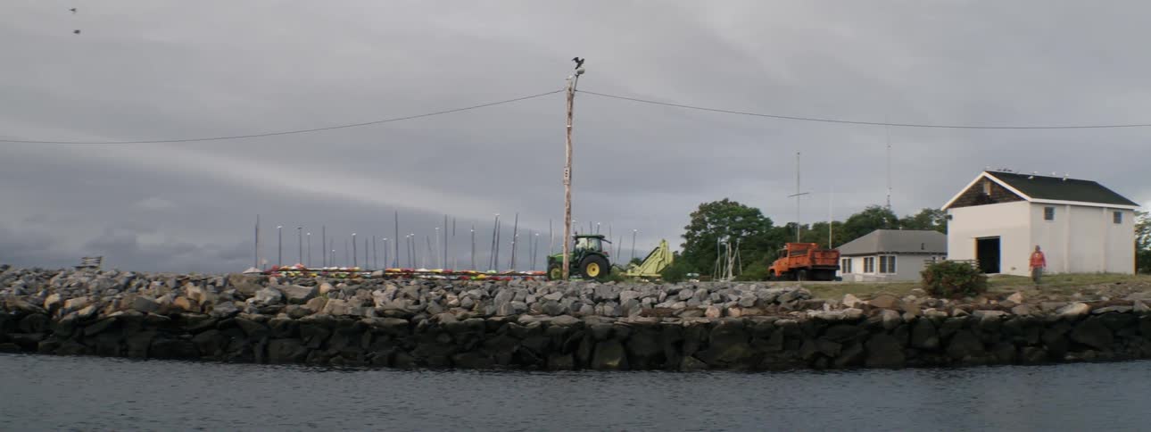 View of a tractor across a body of water