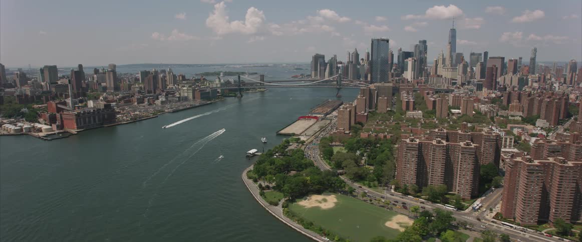 Downtown skyscrapers separated by water and connected by bridges