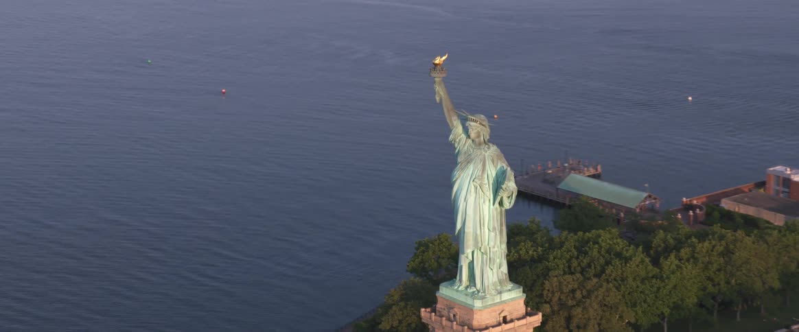 The statue of liberty from above during the day