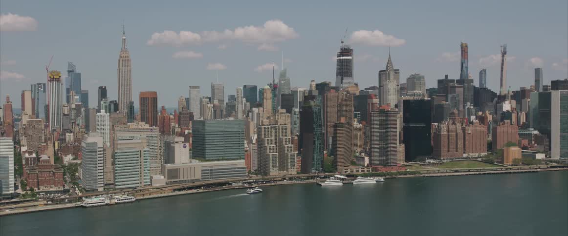 A city with a waterfront during the day