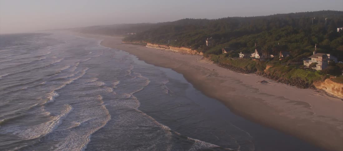 Aerial view of a small town on the cliffs of a beach