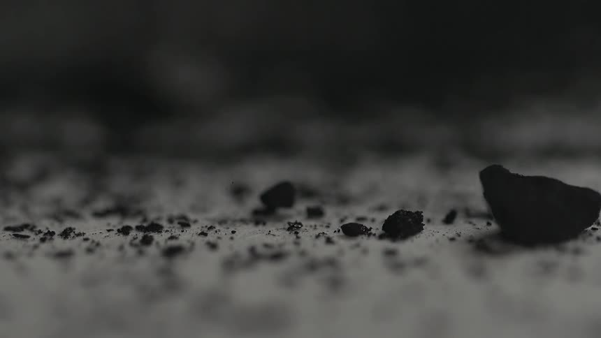 Rock fragments dropping onto the ground
