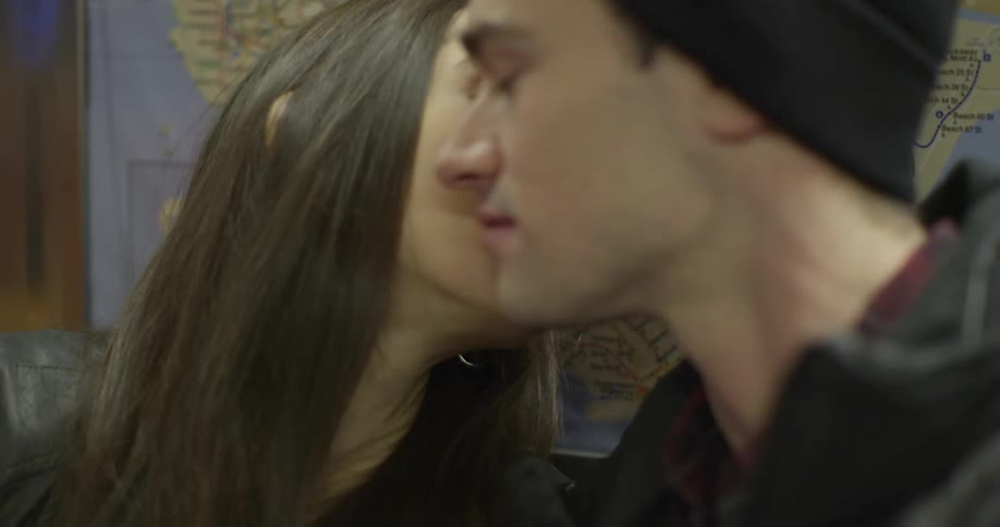 A woman talks to a man
