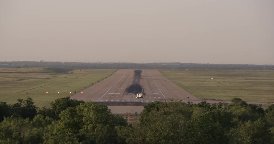 A plane is taking off a runway