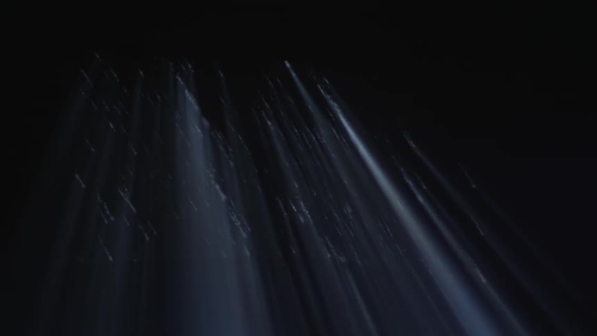 Light shines through holes in a ceiling