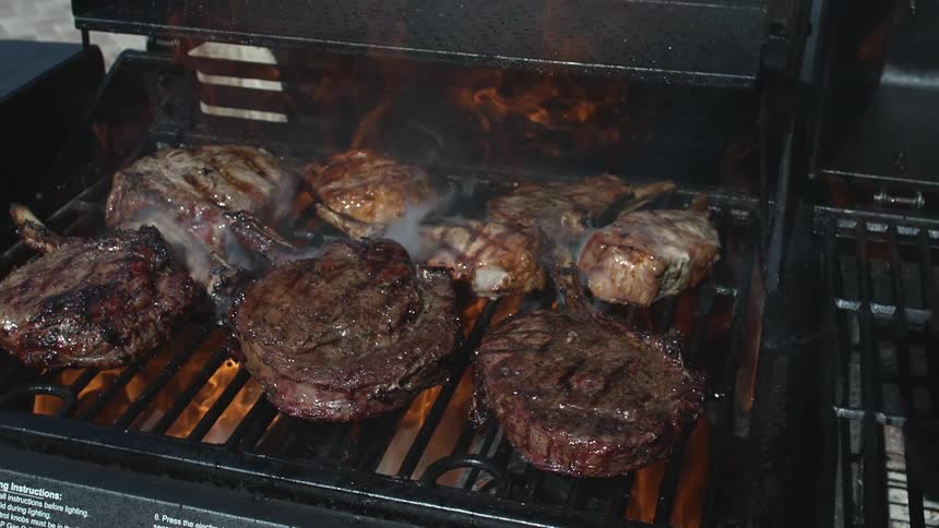 Meat cooking on a grill