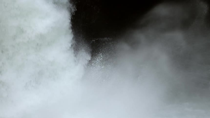 Slow motion shot of the exploding water at the base of Metlako Falls on Eagle Creek deep in the wilderness of the Columbia River Gorge
