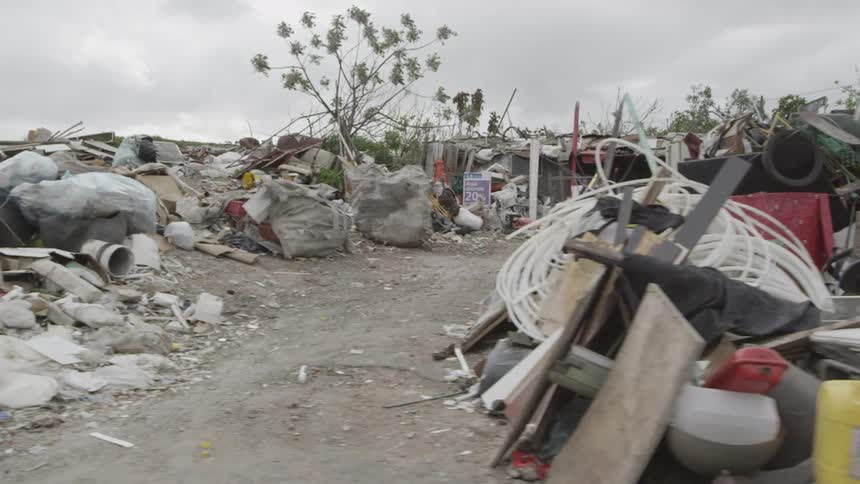 A refugee shelter in a war torn city