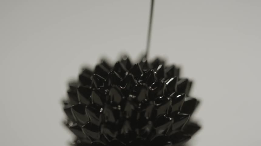 Black liquid form spiky shape