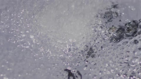 Water flows down a drain