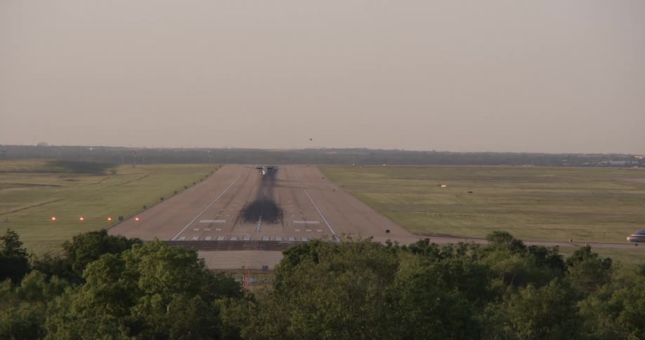 A plane is taking off during the day