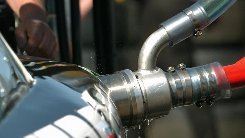 Liquid drips and spills from a nozzle