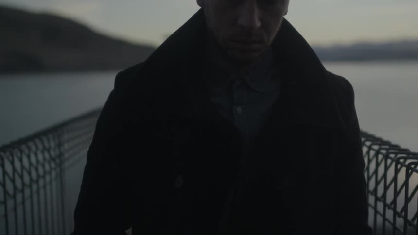 A person walking down a pier