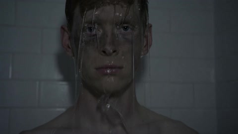 A person standing in a shower