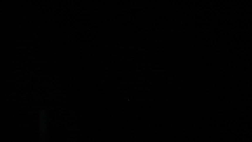 Lights flash on a man taking a shower