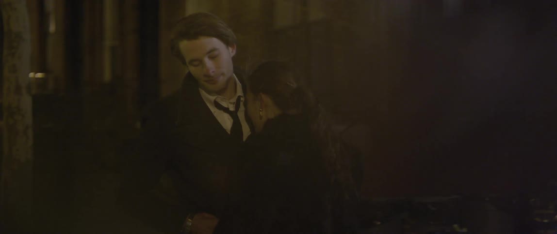 A sad man and woman are embracing each other
