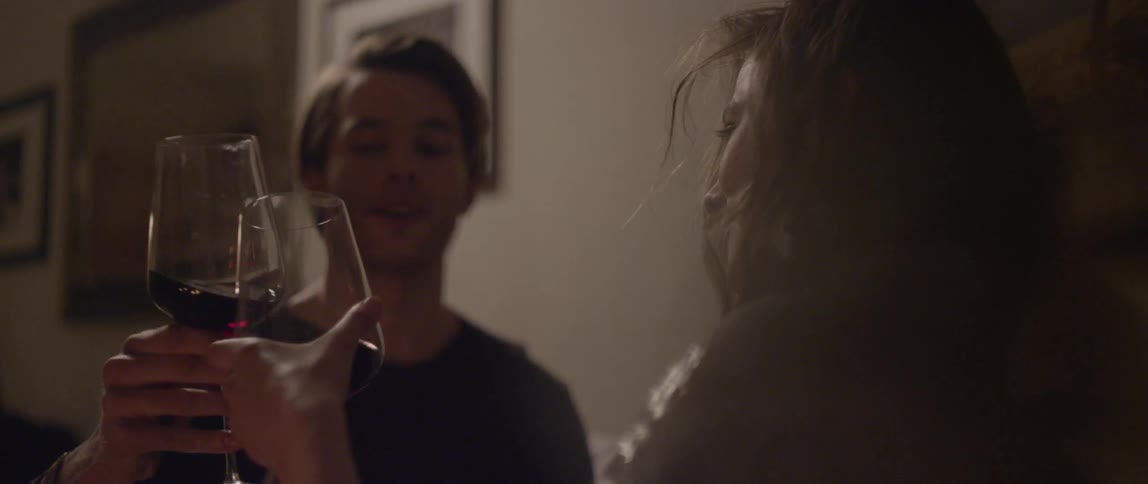 Man and woman share a wine toast
