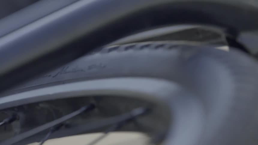A bicycle lays untouched on the ground