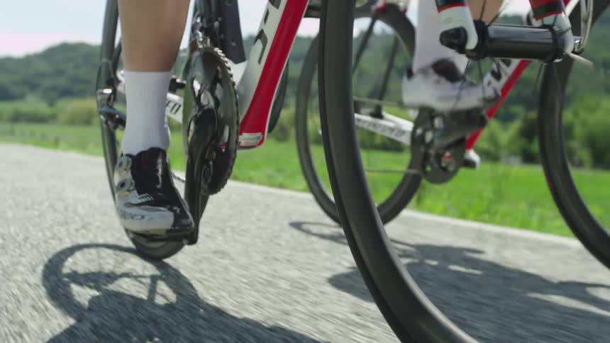 The wheels and tires of a pair of bikes