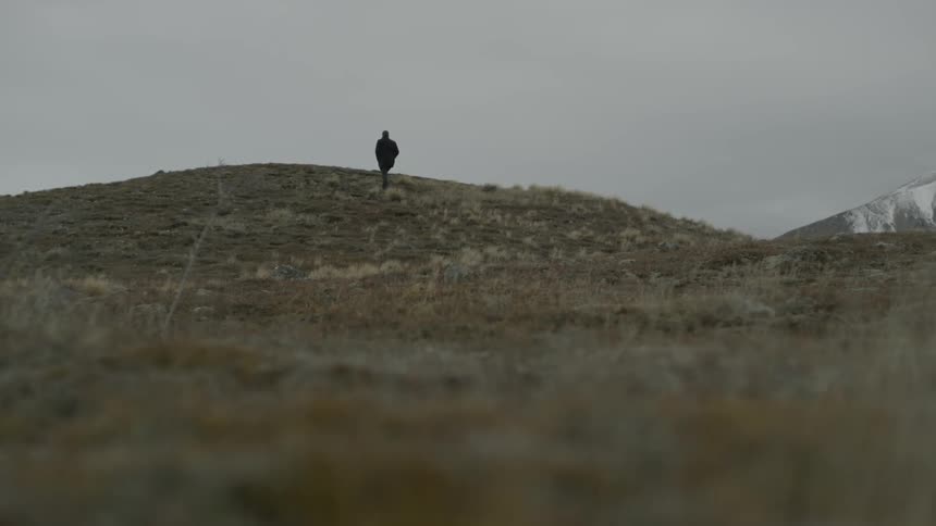 A person walking up a hill