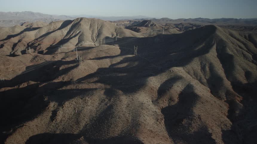 The tops of barren mountains as far as can be seen
