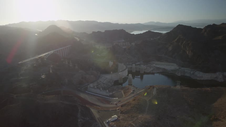 Aerial view of a mountain range and damn