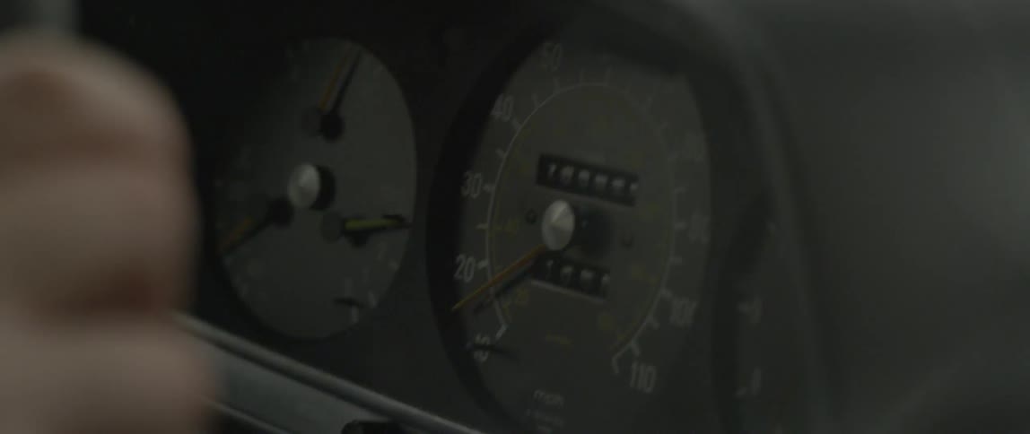 View of a vehicle gauge in a dark area